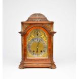 A late 19th century walnut veneered mantel clock