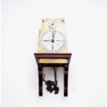 A reproduction Benjamin Franklin wall clock by Thwaites & Reed