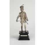 A silver model of a 19th century solider
