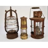 First World War bunker or trench lantern, 'Bat' storm lantern and a miner's lamp