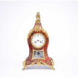 A late 19th century, Louis XV style, Buhl style mantel clock