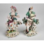 Pair of Derby figures of a bagpipe player and a lady with lute