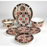 A group of Royal Crown Derby Imari plates and a bowl,