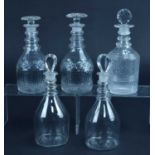 A group of five George III glass decanters and stoppers
