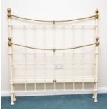 A Seventh Heaven painted cast iron and polished brass 4'6" bedstead