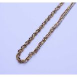 A 9ct tri-coloured gold chain necklace