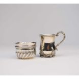 A Victorian silver mug and sugar bowl