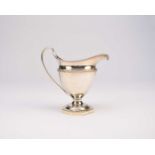 A George III silver pedestal cream jug