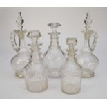 Three George III decanters and a pair of Victorian decanters
