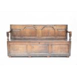 An 18th century oak box settle