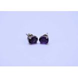 A pair of amethyst stud earrings