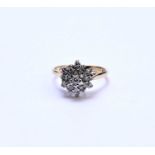 An 18ct gold diamond floral cluster ring