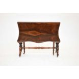 A mid Victorian rosewood Sutherland table