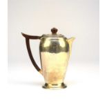 An Art Deco silver hot water jug