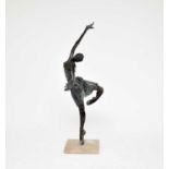 A pair of large cast resin garden/conservatory sculptures of ballet dancers
