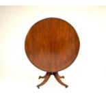 A 19th century mahogany tilt-top breakfast table