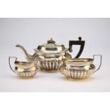 An Edwardian bachelors three piece silver tea service