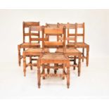 A matched set of ten ash and elm rush-seated chairs