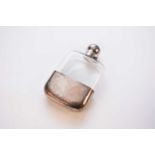 A silver mounted glass hip flask
