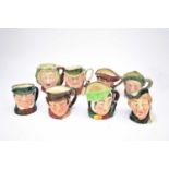 Eight large Royal Doulton and Beswick character jugs