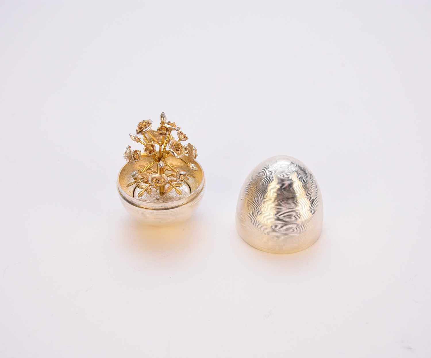 A Nicholas Plummer silver and gilt surprise egg - Image 2 of 2