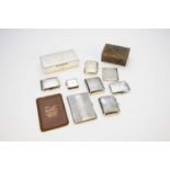 A collection of silver cigarette cases and two cigarette boxes