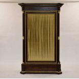 A French Empire style rosewood armoire cabinet