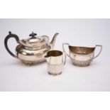 A Victorian silver teapot, cream jug and sugar bowl