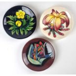 Three Moorcroft pin dishes including Red Tulip