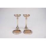 A pair of early 20th century silver mounted posy vases and a pair of silver mounted frames