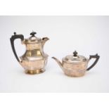 A Victorian silver teapot and a George V silver hot water jug