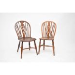 Two yew wood and elm hoop-back chairs