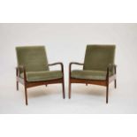 A pair of Greaves & Thomas mid-century teak armchairs