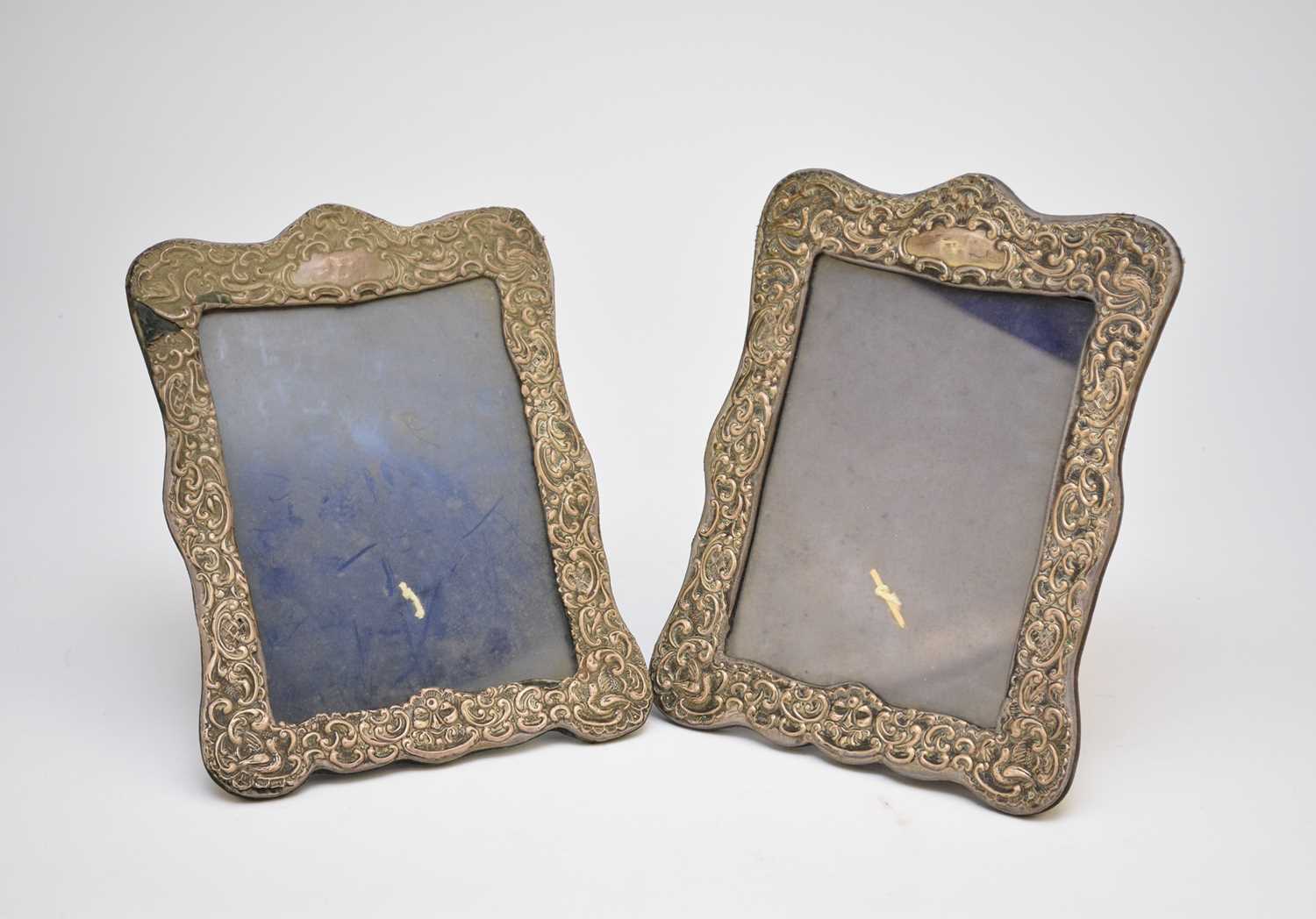 A pair of Edwardian silver photograph frames