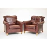 A pair of Duresta leather club type armchairs