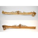 A large 19th century, concave, gilt gesso pelmet