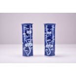 A pair of Chinese blue and white sleeve vases, 19th century