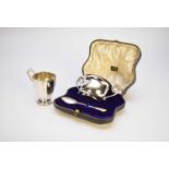 A cased silver Christening bowl and spoon and a silver mug