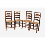 A set of four 19th century ash ladder back chairs