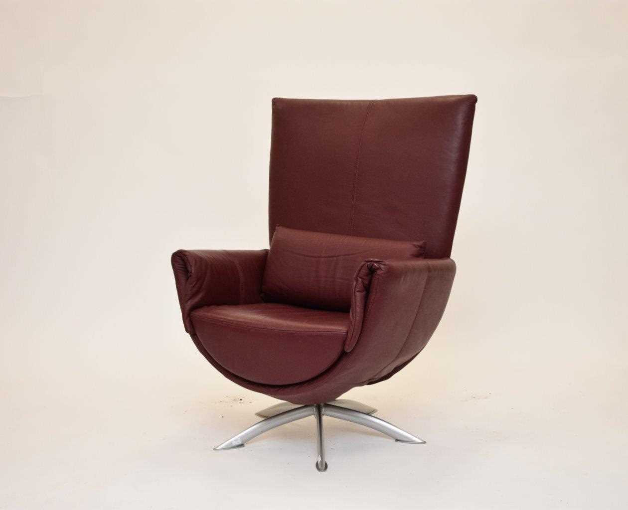 A modern Scandinavian leather and aluminium armchair