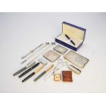 Silver cigarette cases and fountain pens