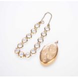 A 9ct gold oval locket and a 9ct gold bracelet