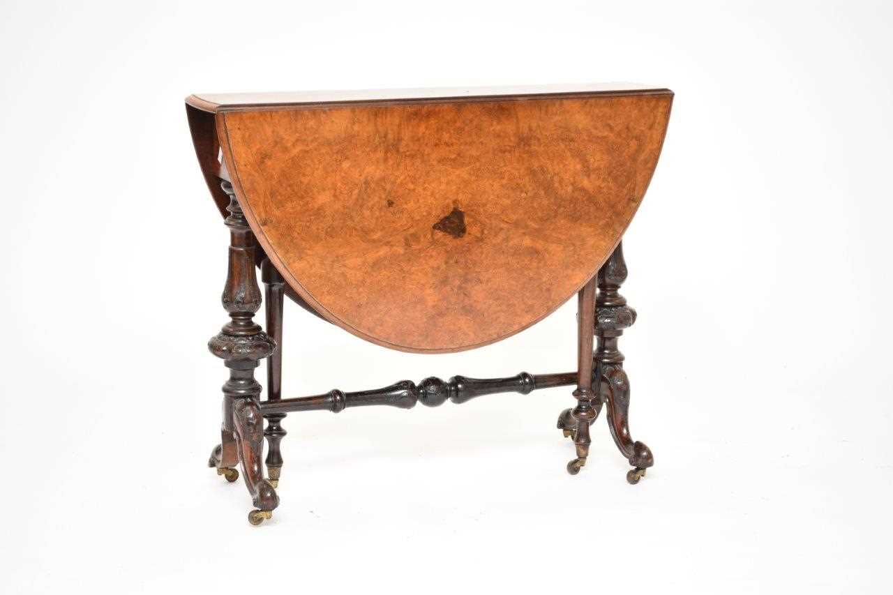 A Victorian walnut Sutherland table