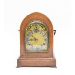 An early 20th century lancet top inlaid rosewood bracket clock