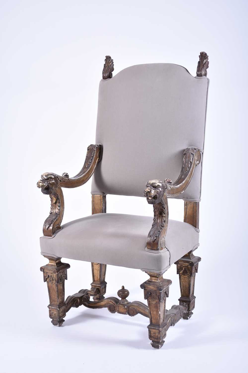 A 19th century continental carved giltwood open armchair