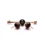 A pair of cabochon garnet and rose cut diamond earrings and a bar brooch