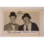 LAUREL & HARDY, Postcard signed by Stan Laurel (1890-1965) and Oliver Hardy (1892-1957)