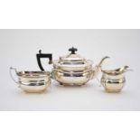 A three piece silver tea service