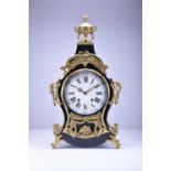 A 19th century Louis XV style ebonised bracket clock and bracket