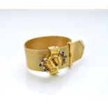 An 18ct gold sapphire and diamond stylised buckle bracelet set with EMKA watch